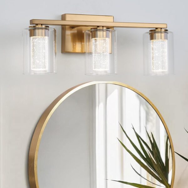 EMONG Lámparas de baño doradas de 3 luces, luces LED regulables de 5CCT con burbuja de cristal y vidrio transparente, luces de baño de latón cepillado ajustables de 2700 K-6500 K.